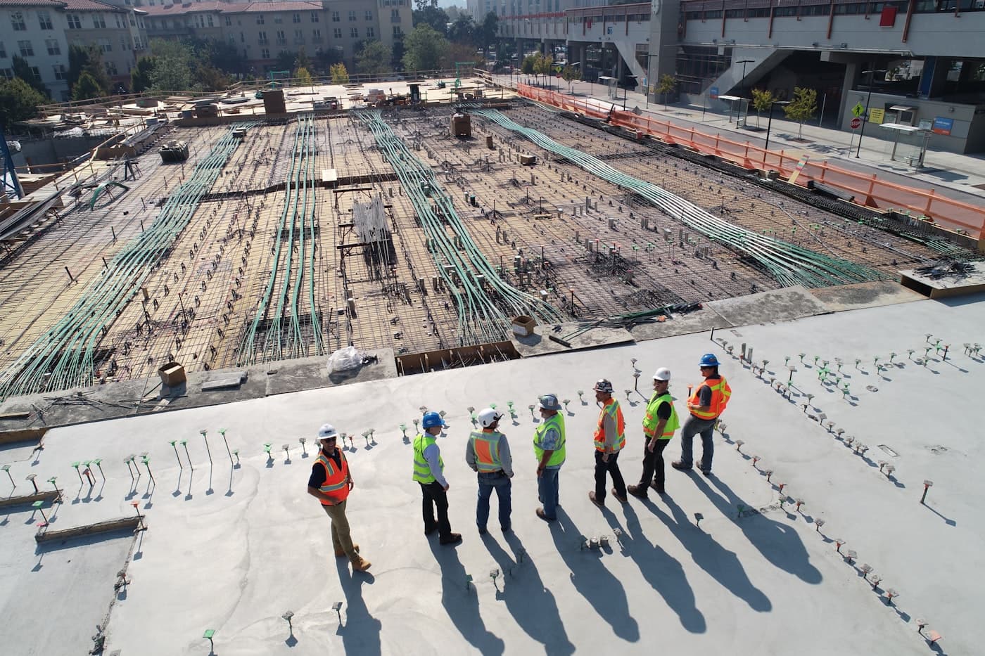 BuildCore crew coordinating work on an active construction site